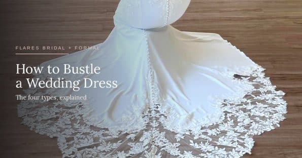 How to bustle a wedding dress: a lace train fanned out behind a bride