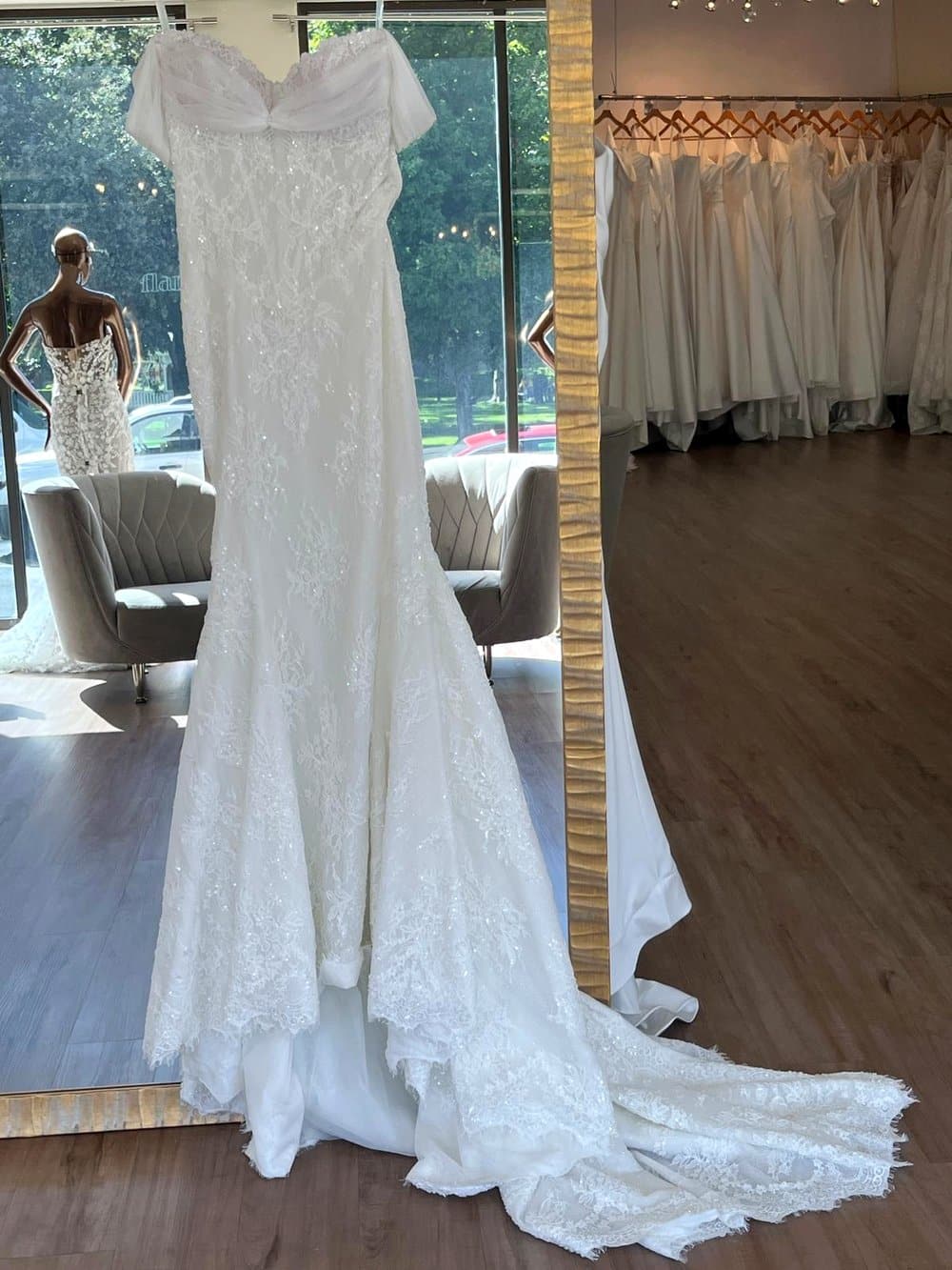 French lace and hand beading on a wedding dress at Flares Bridal + Formal