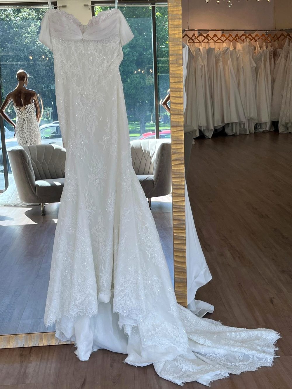 French lace and hand-beaded detail on a wedding dress at Flares Bridal + Formal