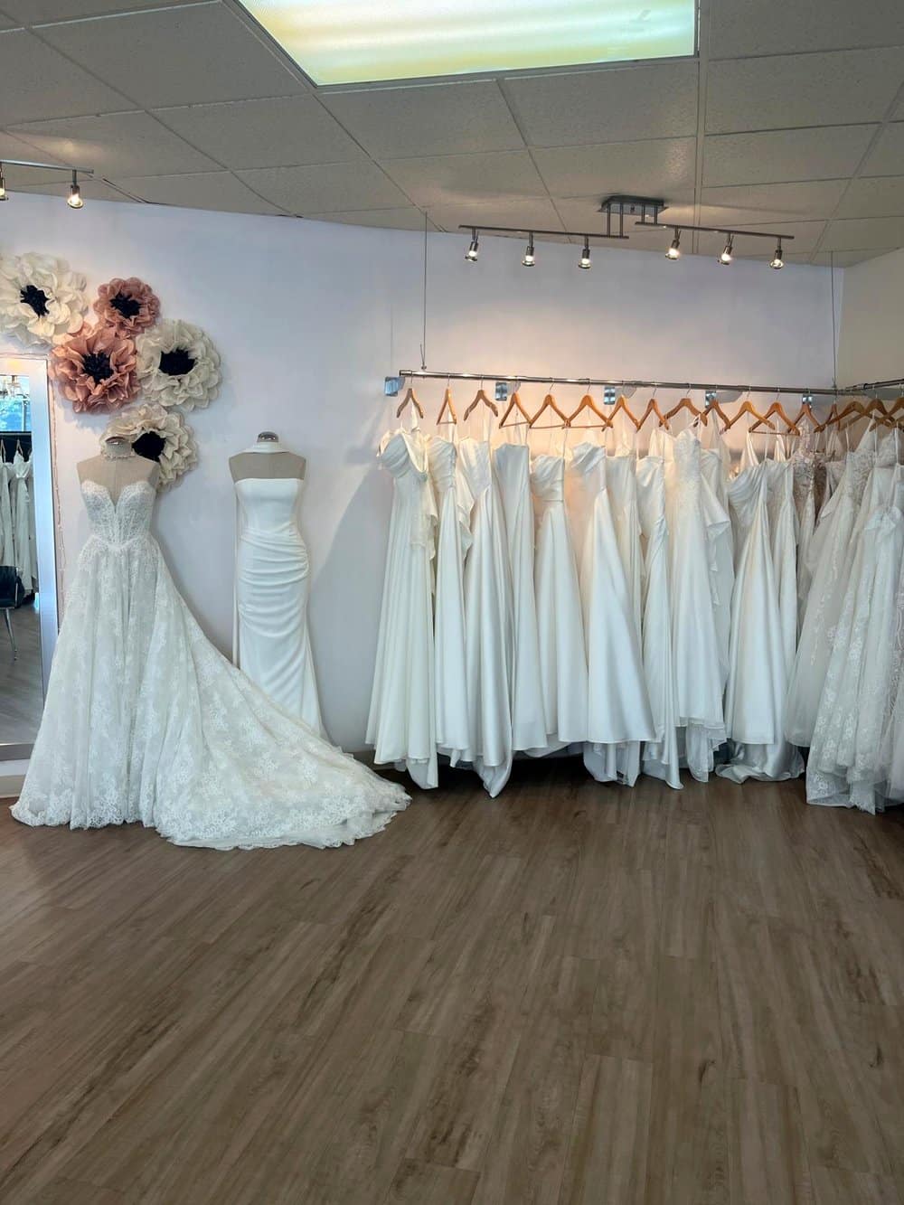 A mermaid wedding dress with a train at Flares Bridal + Formal, Walnut Creek