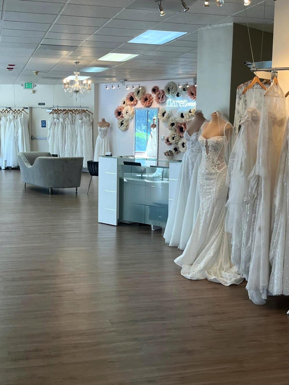 Wedding dresses displayed on mannequins in the Flares Bridal + Formal showroom